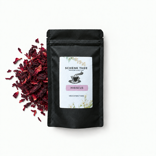 Schenk Thee Hibiscus proefzakje zonder gewichtsaanduiding naast losse gedroogde hibiscus